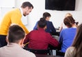 Teacher giving explanation to student Royalty Free Stock Photo