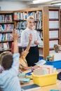 teacher giving lesson in library Royalty Free Stock Photo