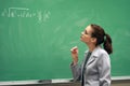 Teacher and the greenboard Royalty Free Stock Photo