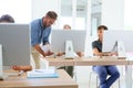 Teacher with group of students working in class Royalty Free Stock Photo