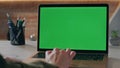 Teacher hands typing mockup laptop at workdesk close up. Unrecognizable worker