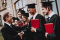 Teacher. Handshake. Students Diplomas. University. Royalty Free Stock Photo