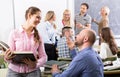 Teacher and happy adult students Royalty Free Stock Photo