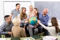 Teacher and happy adult students Royalty Free Stock Photo