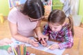 Teacher Harnessing Kids Creativity in the Kindergarten and Preschool Royalty Free Stock Photo