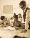 Teacher helping African-American schoolgirl Royalty Free Stock Photo