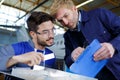 teacher helping apprentice mechanic Royalty Free Stock Photo