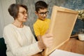 Teacher helping boy study math at home Royalty Free Stock Photo