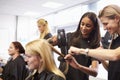 Teacher Helping Students Training To Become Hairdressers Royalty Free Stock Photo