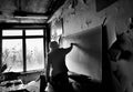 Teacher in her former classroom in Pripyat town Royalty Free Stock Photo