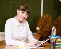 Teacher holding a tablet computer at classroom Royalty Free Stock Photo