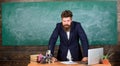 Teacher interesting interlocutor as authority. Teacher bearded man tell scary story. Teacher charismatic hipster stand