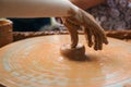 Teacher and kid making ceramic pot. Potters and child hands. Pottery workshop outside. Clay modeling Royalty Free Stock Photo