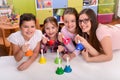 Teacher and Kids Holding Musical Hand Bells