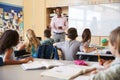 Teacher and kids during a lesson at an elementary school Royalty Free Stock Photo