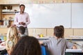 Teacher and kids in a lesson at an elementary school Royalty Free Stock Photo