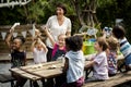 Teacher and kids school learning ecology gardening