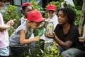 Teacher and kids school learning ecology gardening Royalty Free Stock Photo