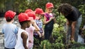 Teacher and kids school learning ecology gardening Royalty Free Stock Photo