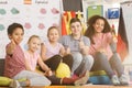 Teacher and kids with thumbs up Royalty Free Stock Photo