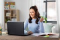 teacher with laptop having online class at home Royalty Free Stock Photo