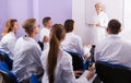 Teacher lecturing to medical students