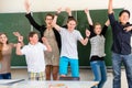 Teacher motivating students in school class Royalty Free Stock Photo