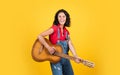 teacher of music. happy beautiful lady playing the guitar. music and vocal. female country singer. cheerful woman sing Royalty Free Stock Photo