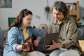 Teacher of music using tablet pc at lesson Royalty Free Stock Photo