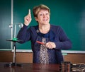 The teacher of physics explains concept of electromagnetic induction Royalty Free Stock Photo