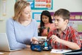 Teacher With Pupils In Science Lesson Studying Robotics Royalty Free Stock Photo