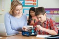 Teacher With Pupils In Science Lesson Studying Robotics Royalty Free Stock Photo