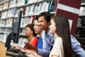 teacher and pupils working on computers Royalty Free Stock Photo