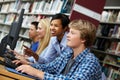 teacher and pupils working on computers Royalty Free Stock Photo