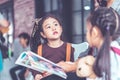 Teacher reading story book to kindergarten students Royalty Free Stock Photo