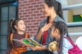 Teacher reading story book to kindergarten students Royalty Free Stock Photo