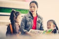 Teacher reading story book to kindergarten students Royalty Free Stock Photo