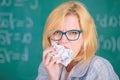 Teacher ready to eat her paperwork. Teacher eats piece of paper absorb information. Thirst of knowledge. Woman teacher Royalty Free Stock Photo