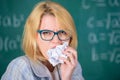 Teacher ready to eat her paperwork. Teacher eats piece of paper absorb information. Thirst of knowledge. Woman teacher Royalty Free Stock Photo