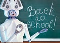 Teacher robot with schoolchild girl in school class near blackboard. Royalty Free Stock Photo