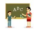 Teacher and school boy near blackboard in flat style Royalty Free Stock Photo