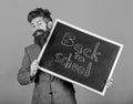 Teacher or school principal welcomes back to school. Are you ready study. Prepare beginning school year. Teacher hiding