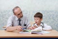 Teacher and schoolboy Royalty Free Stock Photo