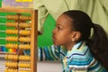 A teacher showing how to use a abacus Royalty Free Stock Photo