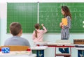 Teacher and students in the classroom: teaching Royalty Free Stock Photo