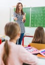 Teacher and students in the classroom: teaching Royalty Free Stock Photo