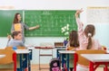 Teacher and students in the classroom: teaching Royalty Free Stock Photo