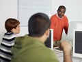 Teacher and students in college Royalty Free Stock Photo