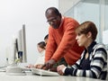 Teacher and students in college Royalty Free Stock Photo