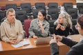 The teacher and students communicate in sign language in the classroom. Hearing impaired and deaf people Royalty Free Stock Photo